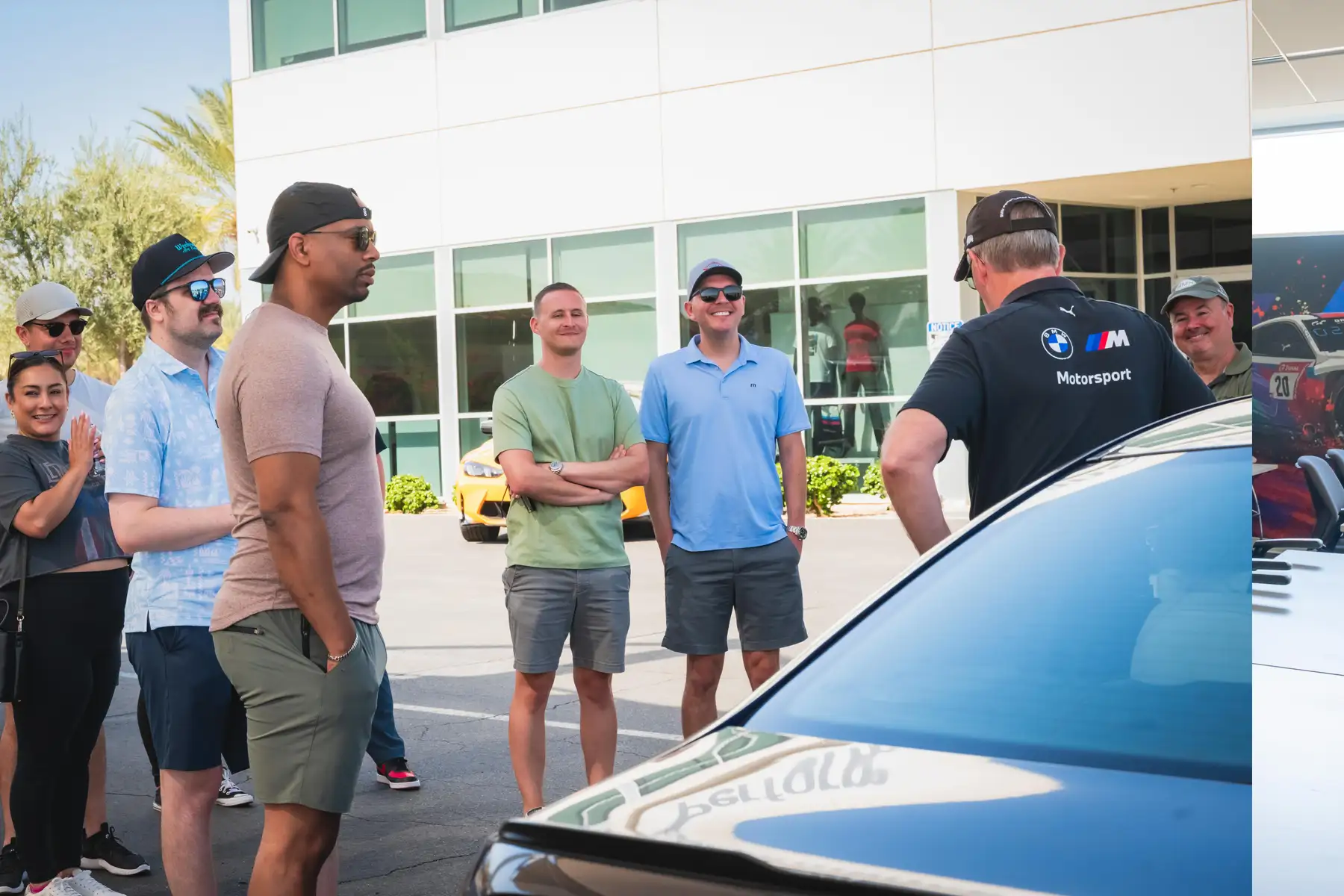 Instructor talking with a group of guests outside the Performance Center